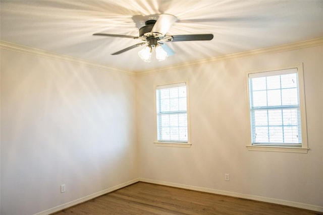 8660 Cedar Hill Rd, Brenham, TX 77833 - empty room featuring healthy amount of natural light, wood finished floors, ornamental molding, and ceiling fan