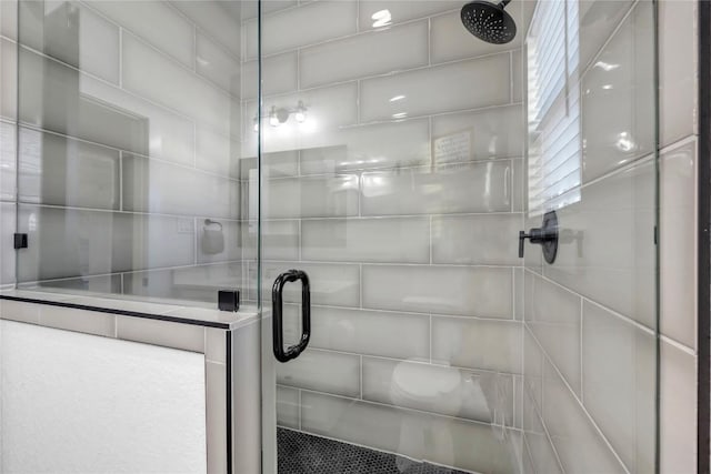 full bathroom featuring a stall shower