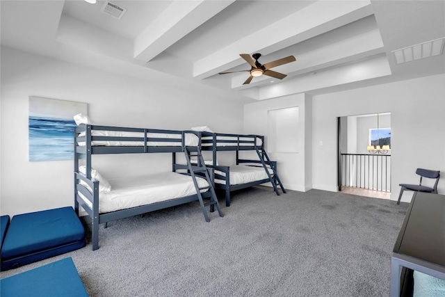 bedroom featuring a ceiling fan, beamed ceiling, visible vents, and carpet