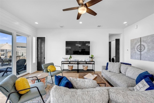 living room with visible vents, wood finished floors, ceiling fan, and recessed lighting