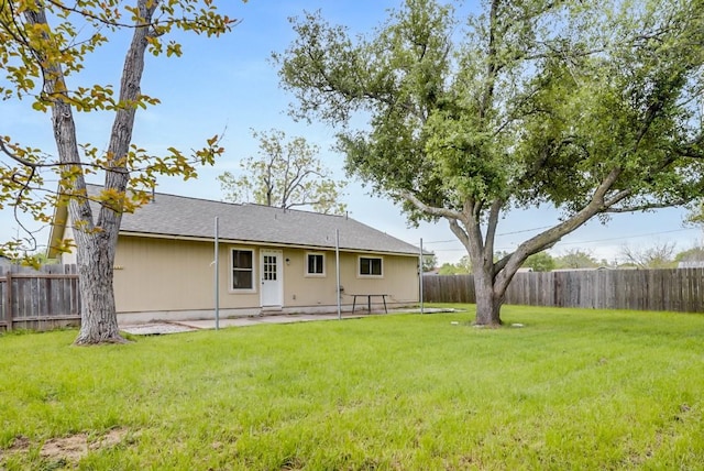 302 Garden Ct, Round Rock, TX 78664 - rear view of house featuring a lawn, a patio area, and a fenced backyard