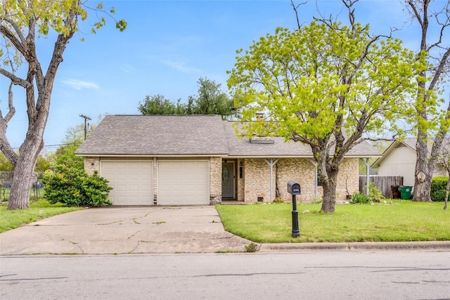 302 Garden Ct, Round Rock, TX 78664 - single story home featuring concrete driveway, an attached garage, fence, and a front yard