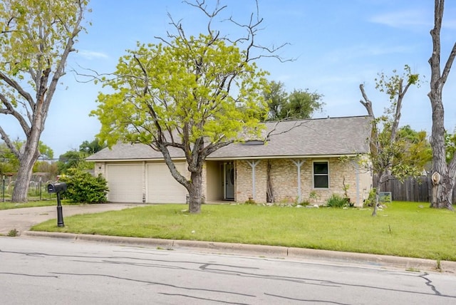 302 Garden Ct, Round Rock, TX 78664 - ranch-style home featuring roof with shingles, fence, concrete driveway, a garage, and a front yard