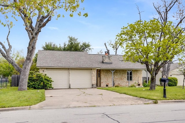 302 Garden Ct, Round Rock, TX 78664 - ranch-style house featuring an attached garage, a chimney, concrete driveway, a front yard, and brick siding