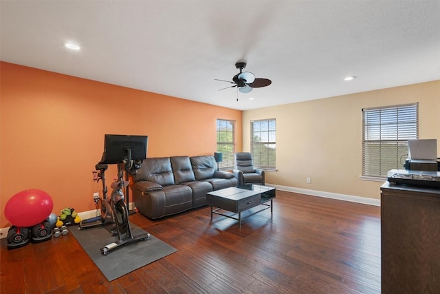 living area with baseboards, dark wood-style flooring, a ceiling fan, and recessed lighting