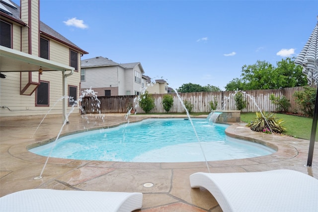 view of swimming pool featuring a patio area, a fenced in pool, and a fenced backyard