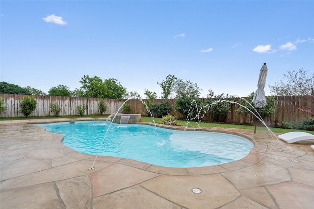 view of swimming pool with a fenced backyard, a patio area, and a fenced in pool