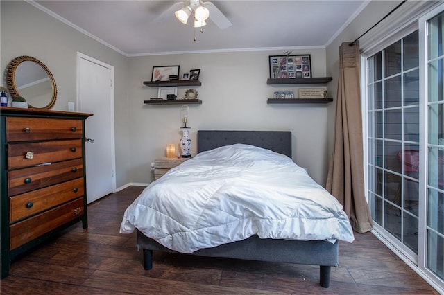 bedroom featuring ceiling fan, wood finished floors, baseboards, and ornamental molding