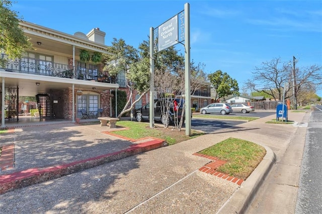 7920 Rockwood Ln Unit 115, Austin, TX 78757 - view of street featuring curbs, stairs, and sidewalks