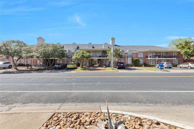 7920 Rockwood Ln Unit 115, Austin, TX 78757 - view of asphalt street featuring curbs and sidewalks