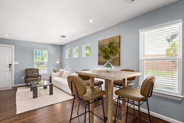 1183 Coleto St, Austin, TX 78702 - dining room with baseboards, dark wood-type flooring, and recessed lighting