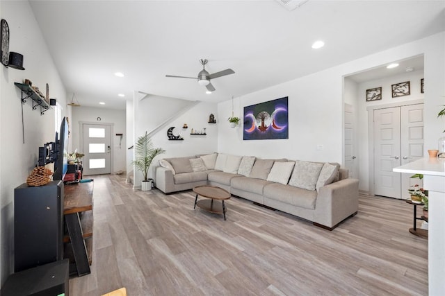 8220 Linnie Ln, Austin, TX 78724 - living room featuring light wood-style floors, a ceiling fan, and recessed lighting