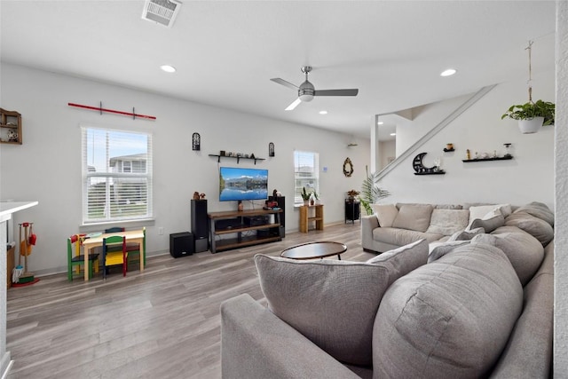 8220 Linnie Ln, Austin, TX 78724 - living room with healthy amount of natural light, light wood-style floors, a ceiling fan, and recessed lighting