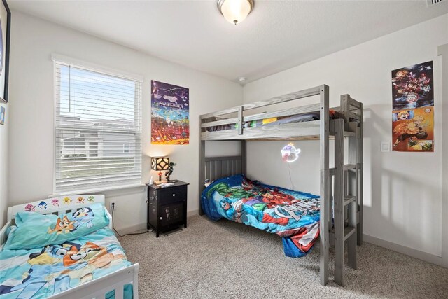 8220 Linnie Ln, Austin, TX 78724 - bedroom with carpet flooring and baseboards