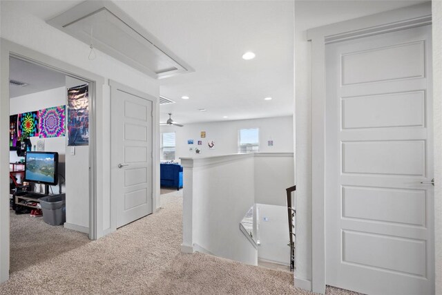8220 Linnie Ln, Austin, TX 78724 - corridor featuring attic access, carpet, an upstairs landing, recessed lighting, and baseboards