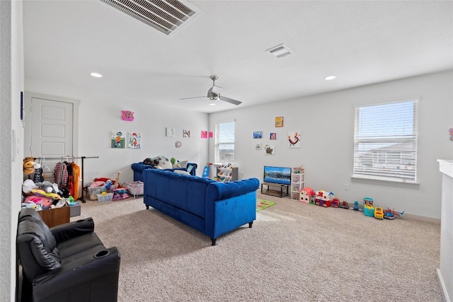 8220 Linnie Ln, Austin, TX 78724 - carpeted living room with recessed lighting and a ceiling fan