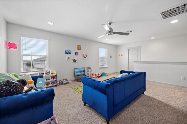 8220 Linnie Ln, Austin, TX 78724 - carpeted living area featuring a ceiling fan and recessed lighting