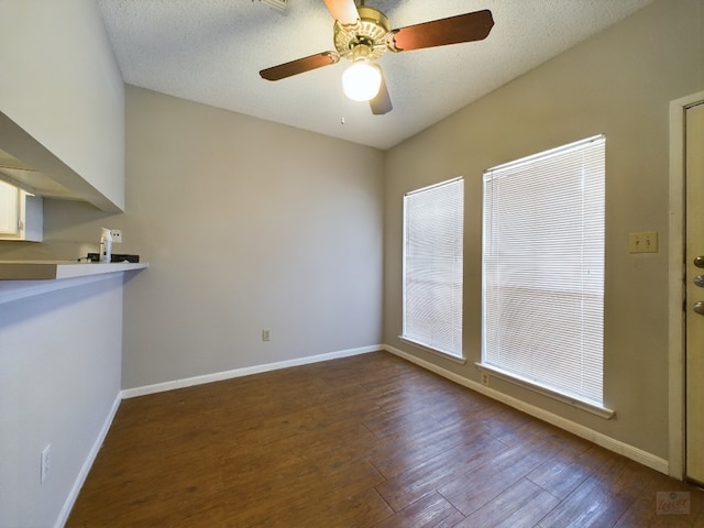 2901 San Jacinto Blvd Unit 105, Austin, TX 78705 - empty room featuring a textured ceiling, baseboards, ceiling fan, and hardwood / wood-style flooring