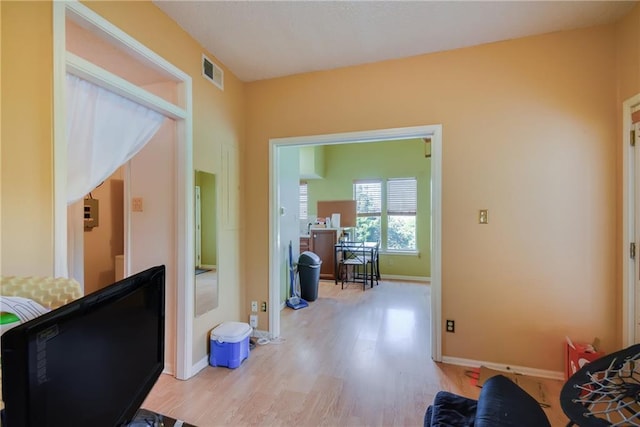 3115 Tom Green St Unit 404, Austin, TX 78705 - hallway featuring visible vents, light wood-style flooring, and baseboards