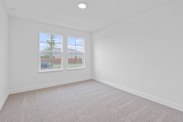 409 Rivers Edge Dr, Georgetown, TX 78628 - carpeted empty room featuring baseboards