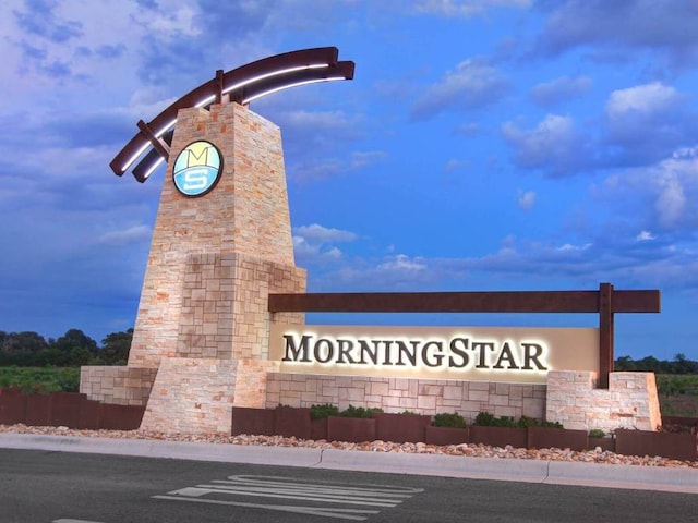 view of community sign