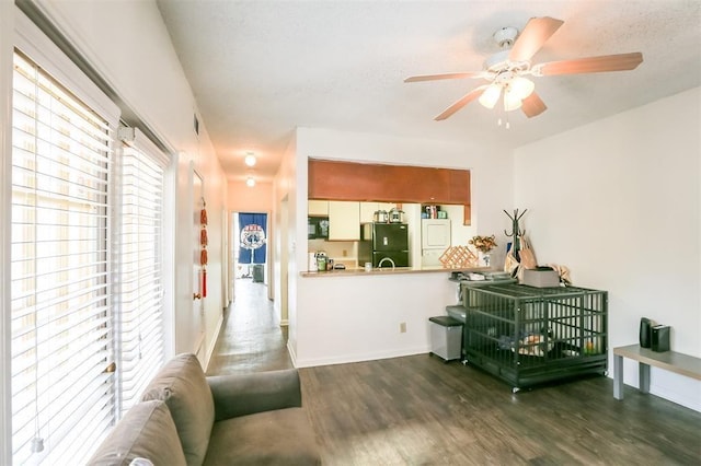 912 W 22nd St Unit 307, Austin, TX 78705 - living area featuring wood finished floors and ceiling fan