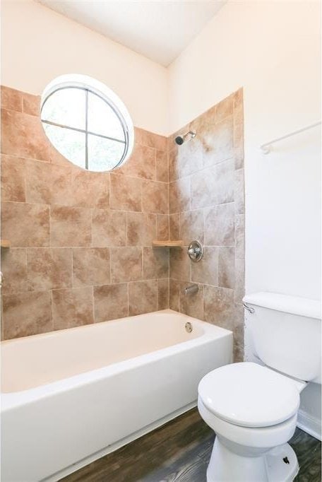 912 W 22nd St Unit 307, Austin, TX 78705 - bathroom with toilet, shower / bathtub combination, and wood finished floors