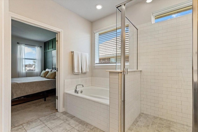 1001 Dog Iron St, Georgetown, TX 78633 - full bathroom with tile patterned floors, a bath, ensuite bath, and a stall shower