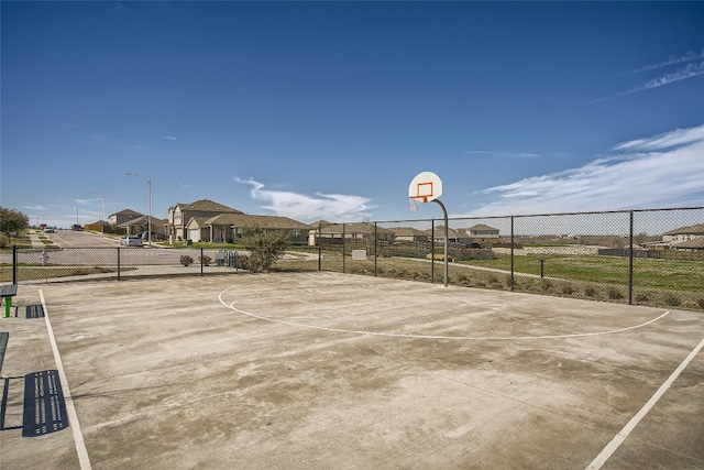 view of sport court with fence and community basketball court