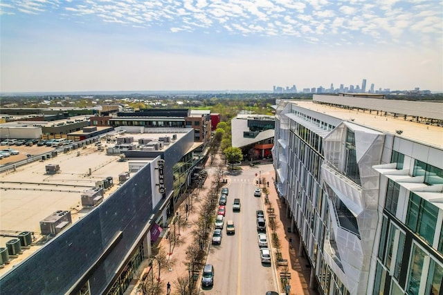 birds eye view of property featuring a city view