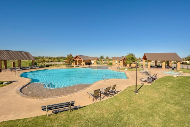 pool with a yard, a gazebo, and a patio