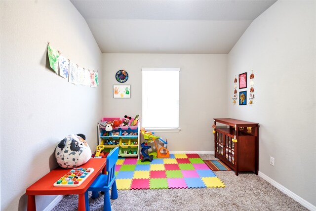2945 Mill Run Bnd, Round Rock, TX 78665 - game room featuring lofted ceiling, carpet flooring, and baseboards