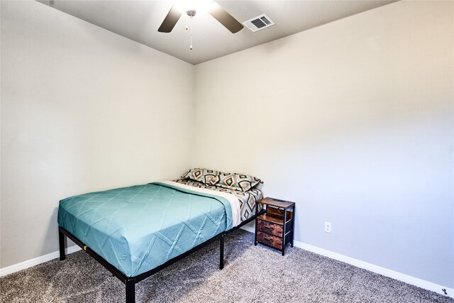 2945 Mill Run Bnd, Round Rock, TX 78665 - carpeted bedroom with baseboards and ceiling fan