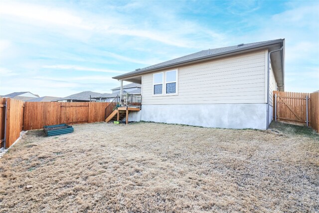 2945 Mill Run Bnd, Round Rock, TX 78665 - rear view of house with a fenced backyard and stairs