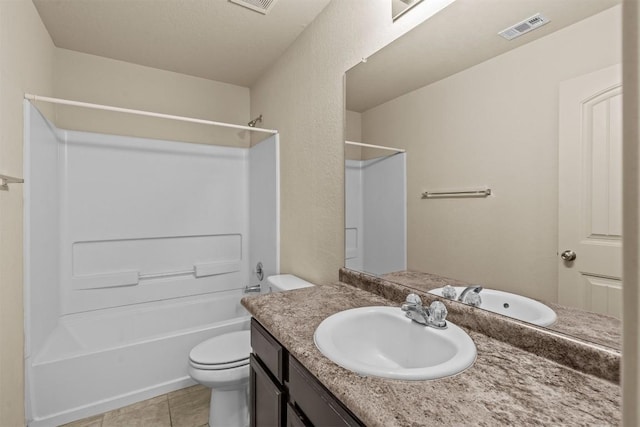 1021 Polmont Ct, Seguin, TX 78155 - full bathroom with toilet,  shower combination, visible vents, tile patterned flooring, and vanity
