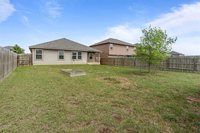 1021 Polmont Ct, Seguin, TX 78155 - back of house with a fenced backyard and a lawn