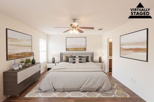 287 Quarter Ave, Buda, TX 78610 - bedroom with wood finished floors, ceiling fan, baseboards, and ensuite bath