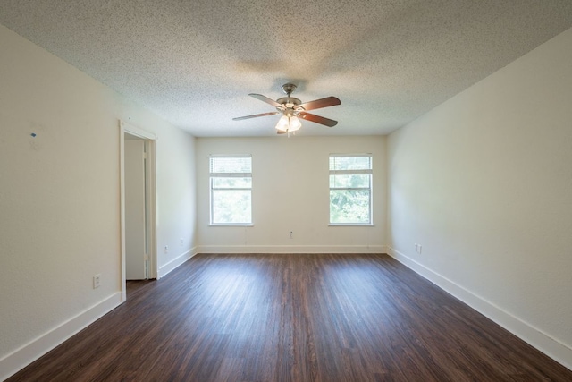 1304 Green Terrace Dr, Round Rock, TX 78664 - unfurnished room featuring ceiling fan, dark wood-type flooring, a textured ceiling, and baseboards