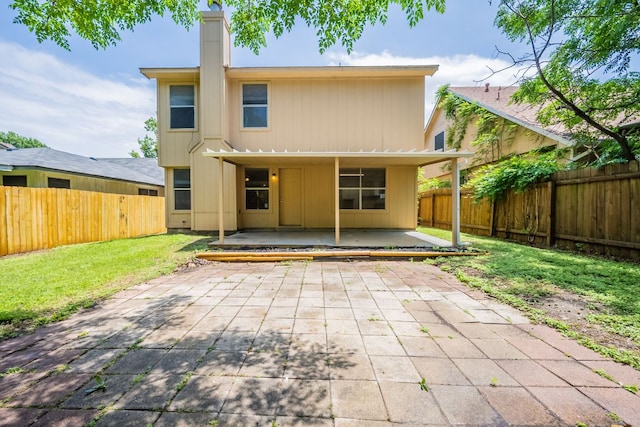 1304 Green Terrace Dr, Round Rock, TX 78664 - rear view of property with a patio and a chimney