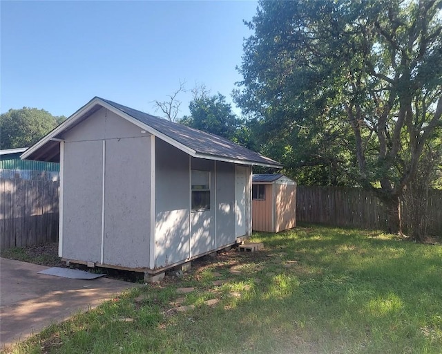 view of shed featuring a fenced backyard