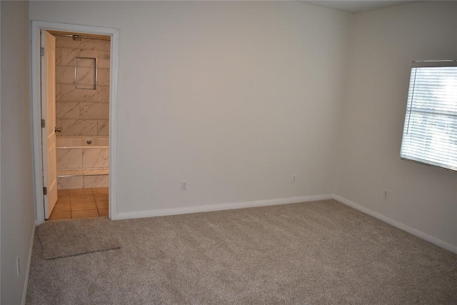 1007 N Bishop St, San Marcos, TX 78666 - carpeted spare room with baseboards
