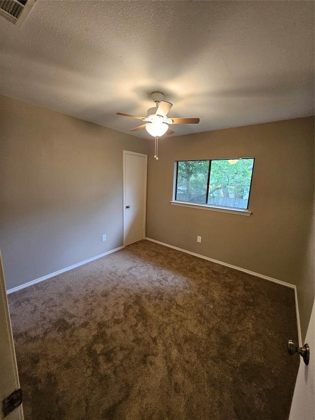 4402 Keota Dr, Austin, TX 78749 - unfurnished room with carpet flooring, baseboards, a ceiling fan, and visible vents