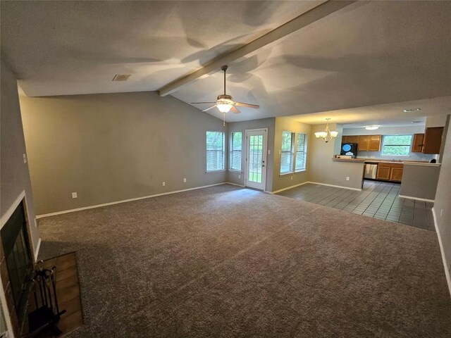 4402 Keota Dr, Austin, TX 78749 - unfurnished living room with ceiling fan with notable chandelier, visible vents, dark colored carpet, baseboards, and vaulted ceiling with beams