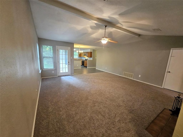 4402 Keota Dr, Austin, TX 78749 - unfurnished living room with ceiling fan with notable chandelier, vaulted ceiling with beams, visible vents, baseboards, and dark colored carpet