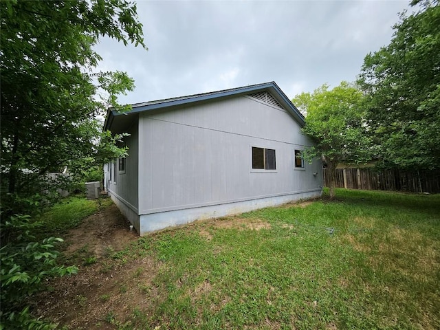 4402 Keota Dr, Austin, TX 78749 - view of home's exterior with a yard, central air condition unit, and fence