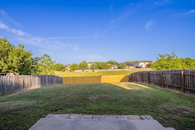 view of yard featuring a fenced backyard