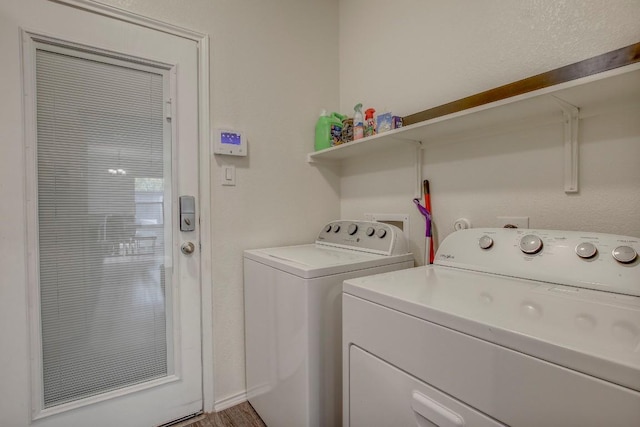 clothes washing area featuring laundry area and independent washer and dryer