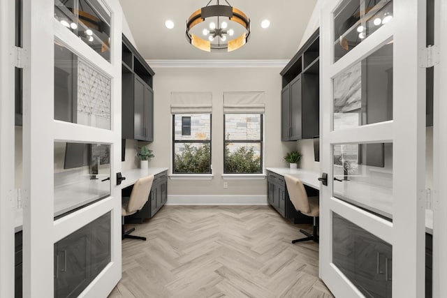 office space with built in desk, recessed lighting, crown molding, a chandelier, and baseboards