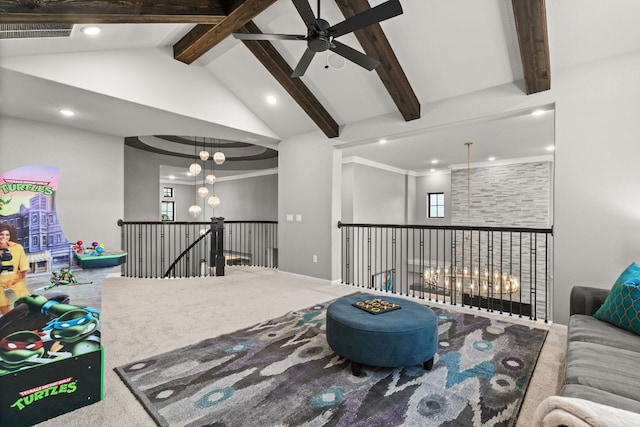 carpeted living room featuring beamed ceiling, ceiling fan with notable chandelier, visible vents, and recessed lighting