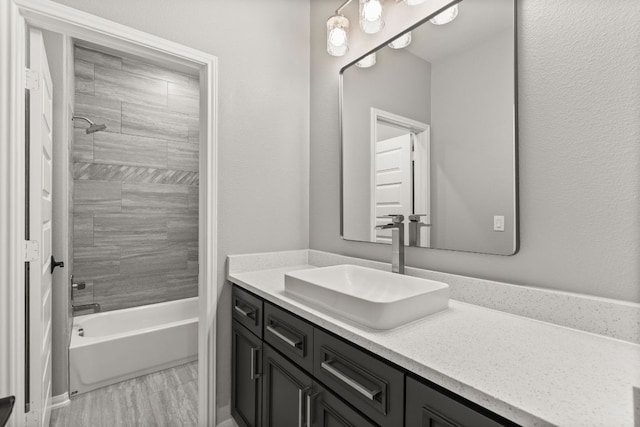 bathroom featuring vanity and bathtub / shower combination